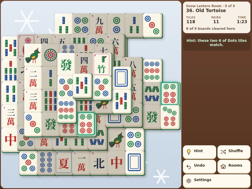 Actual Teahouse Mahjong gameplay on the Old Tortoise board with Classic tiles: dots, bamboo, characters, dragons and flowers stacked in layers with 118 tiles left, two 6 of Dots tiles outlined in green as a hint, and the side panel showing the Snow Lantern Room, 11 open pairs and the message Hint: these two 6 of Dots tiles match.
